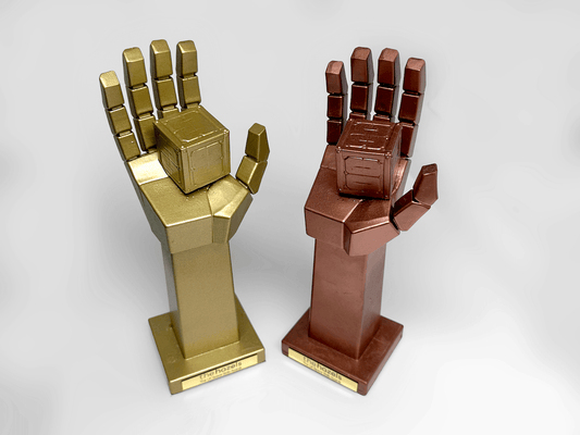 Metallic 3D printed hand block award, custom-formed and hand-sprayed, East London studio