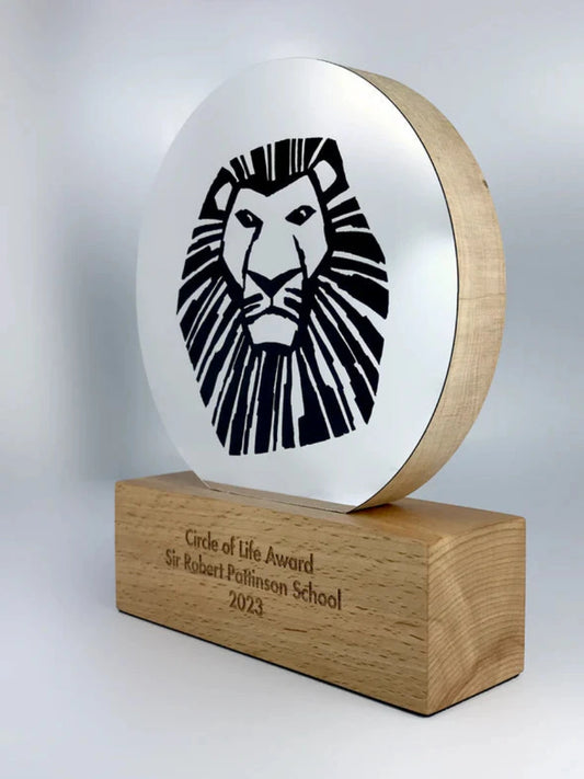 Wooden award with metallic front plate and graphic