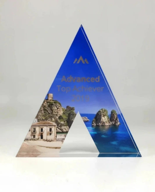 Triangular award with printed design and engraved text