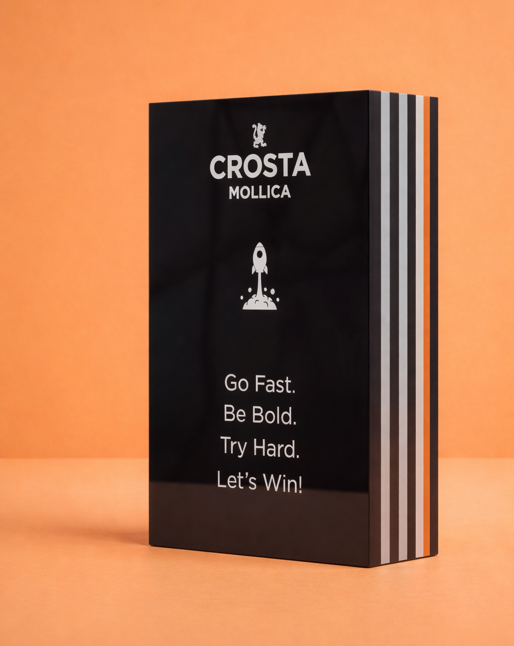 Black acrylic award for CROSTA MOLLICA, bespoke crafted creation with coloured stripes on the side.