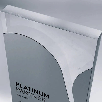 Clear acrylic award with metallic profile and printed text