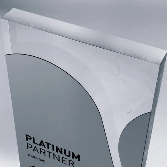 Clear acrylic award with metallic profile and printed text