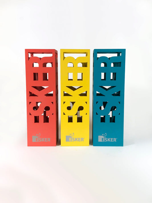 Colourful metal award in the style of a cage