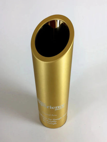 Gold cylindrical award with engraved text 