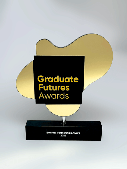 Black acrylic splat-shaped trophy with polished gold laminate face, Graduate Futures Awards branding.