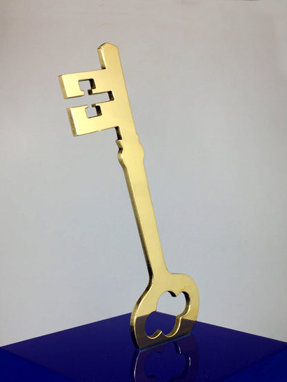 Gold Key on Blue Acrylic Base