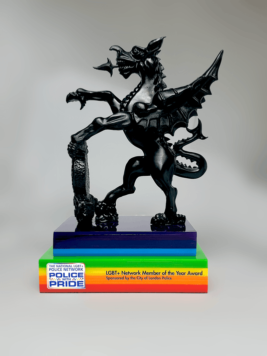 Bespoke 3D printed griffin trophy in matte black resin on layered rainbow Pride acrylic base