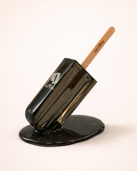 an acrylic melting lolly award in black on a white background