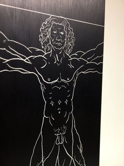 Incredibly detailed etched vitruvian man into a metal award.