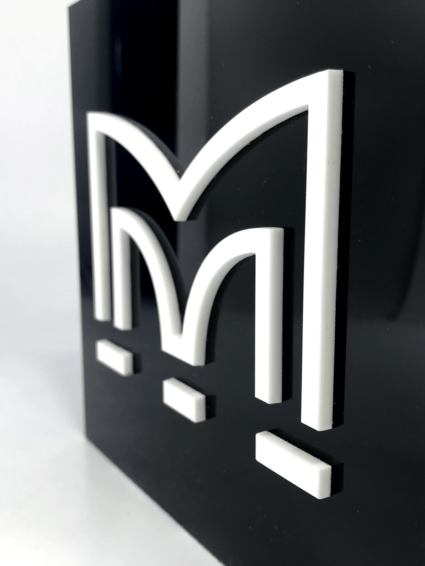 White Perspex M on Black Acrylic Award 