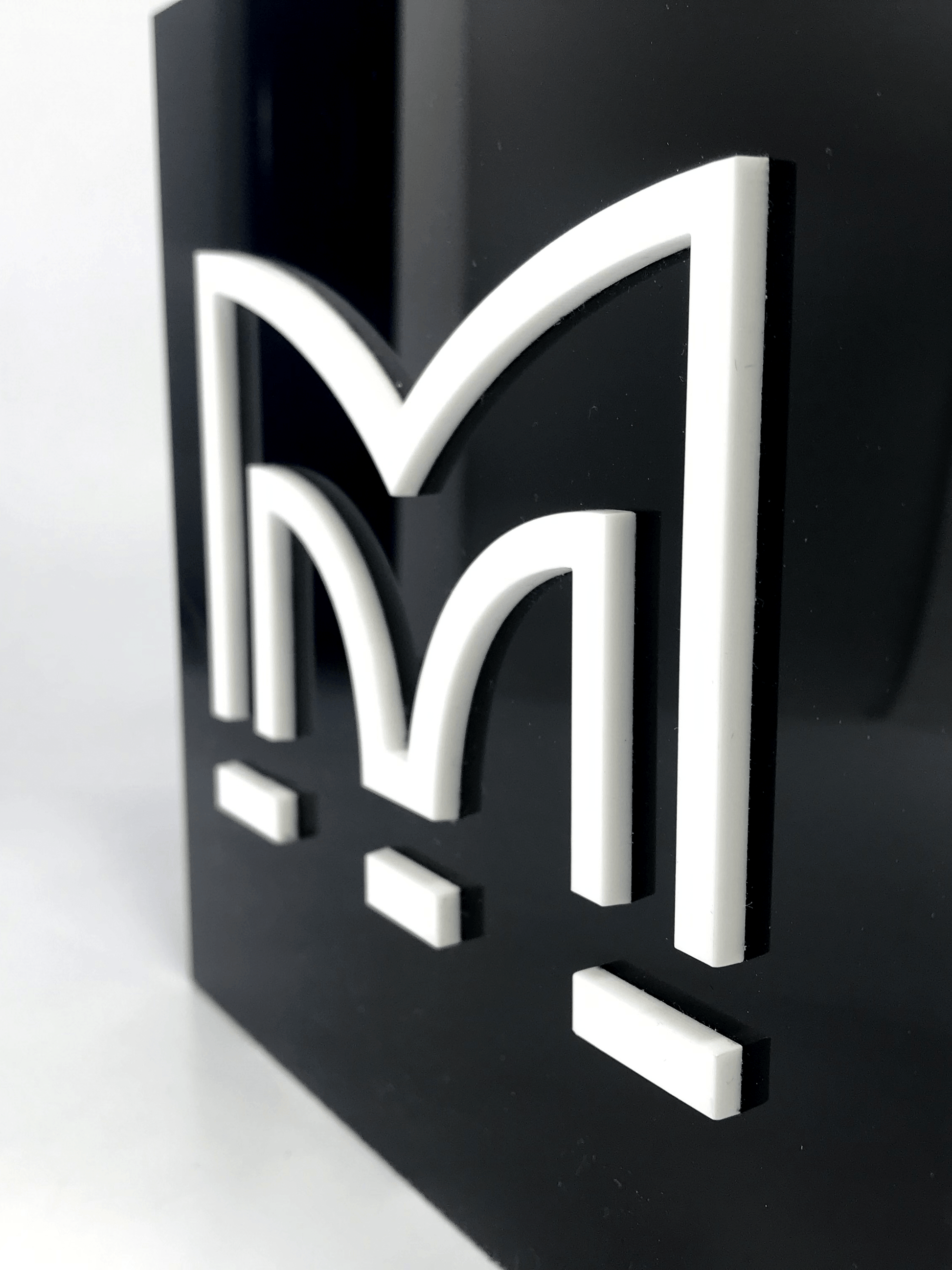 White Perspex M on Black Acrylic Award 