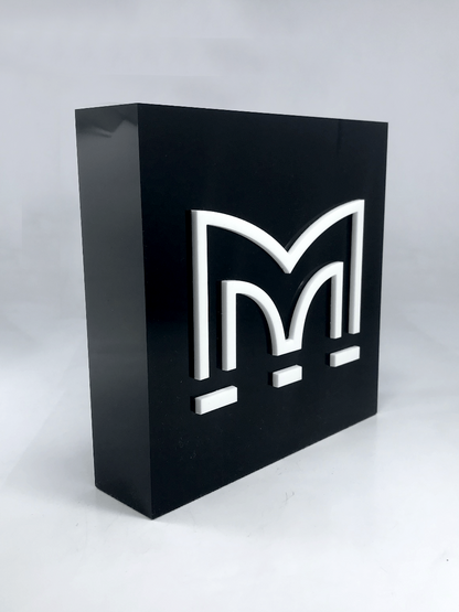 White Perspex M on Black Acrylic Award 