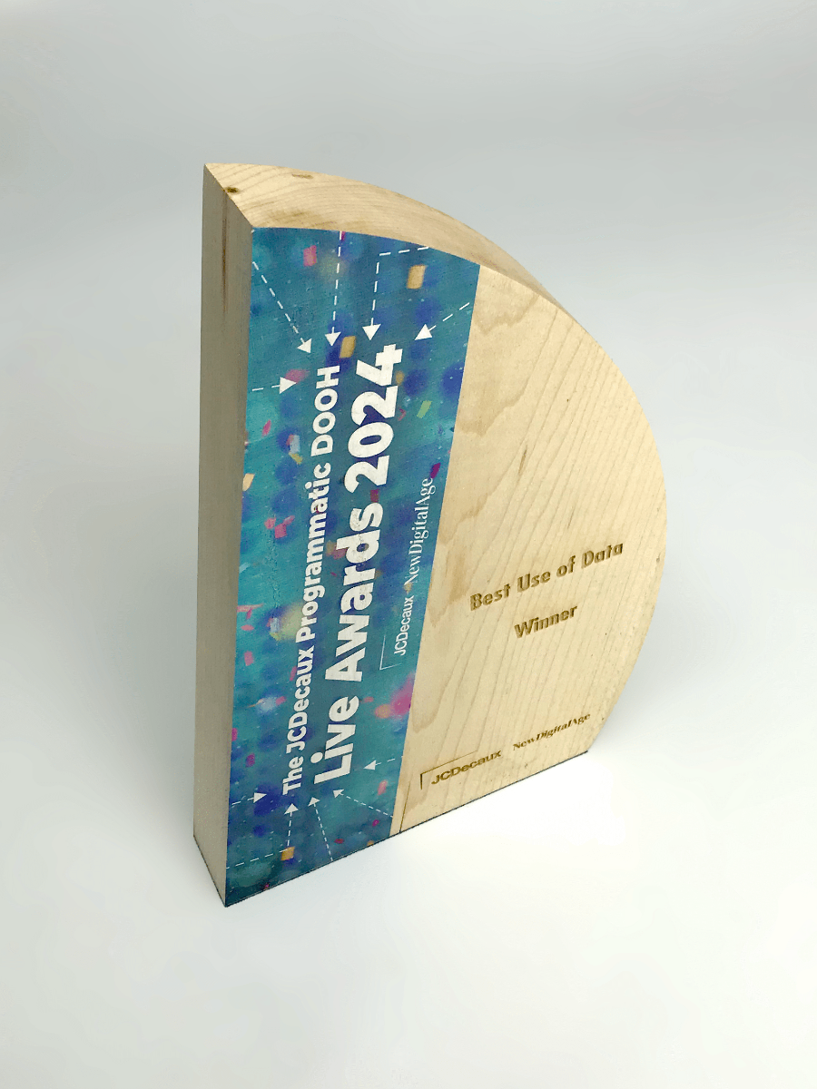 Wooden award with blue and multicolor design on a white background