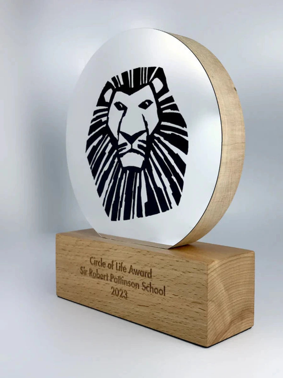 Wooden award with metallic front plate and graphic