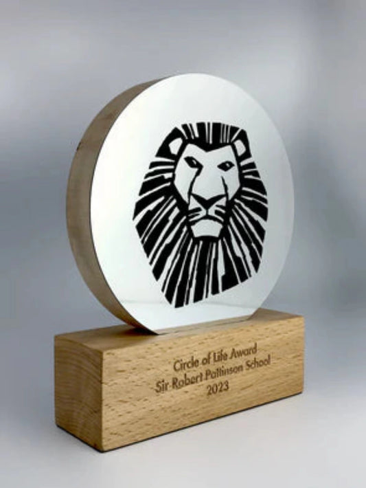 Wooden award with metallic front plate and graphic