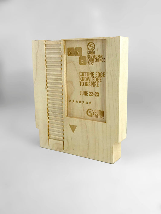 Wooden box with laser engraving on a white background