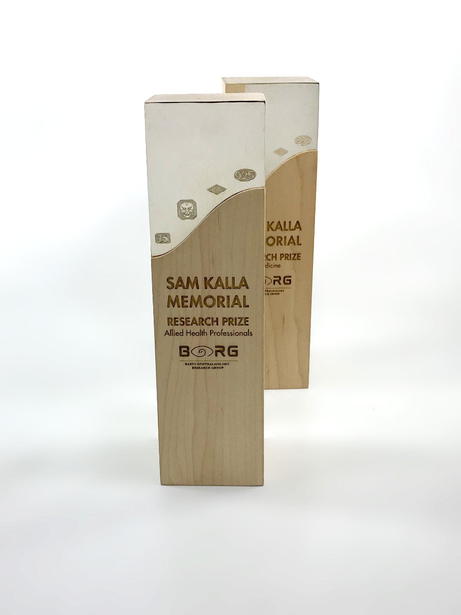 Engraved Beech wood wave with a sterling silver engraved inlay.