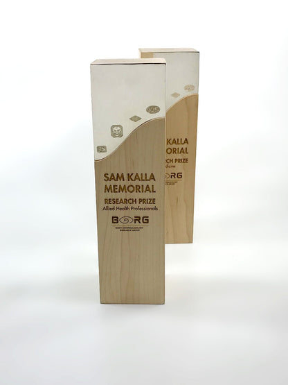 Engraved Beech wood wave with a sterling silver engraved inlay.