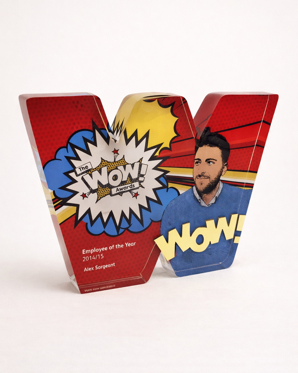 An acrylic W award with an image and engraving printed. The award is on a white background.