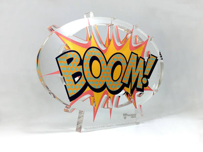 Boom Acrylic Awards with boom written in comic style writing on a clear acrylic base.
