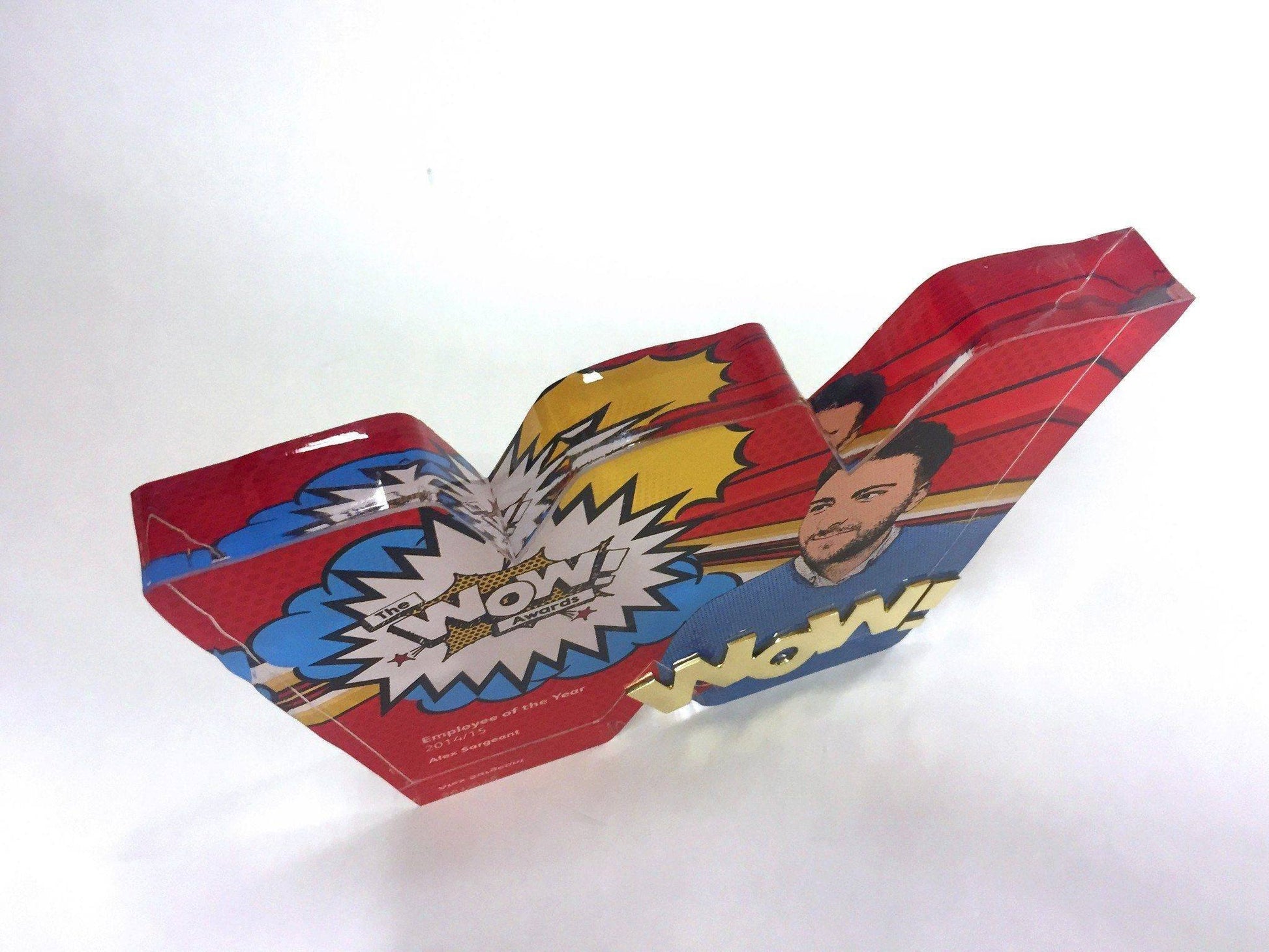 above view of acrylic custom image award on a white background.